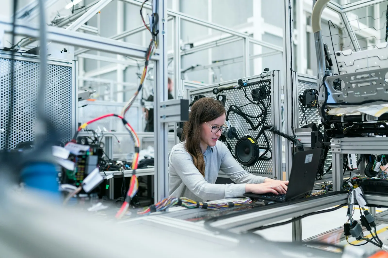 A developer works on a digital connection that links supplier data to internal systems.
