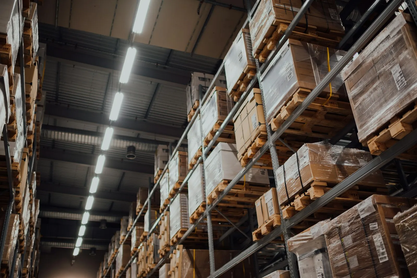A warehouse with stock and parcels as context for supplier data and purchase order lines.