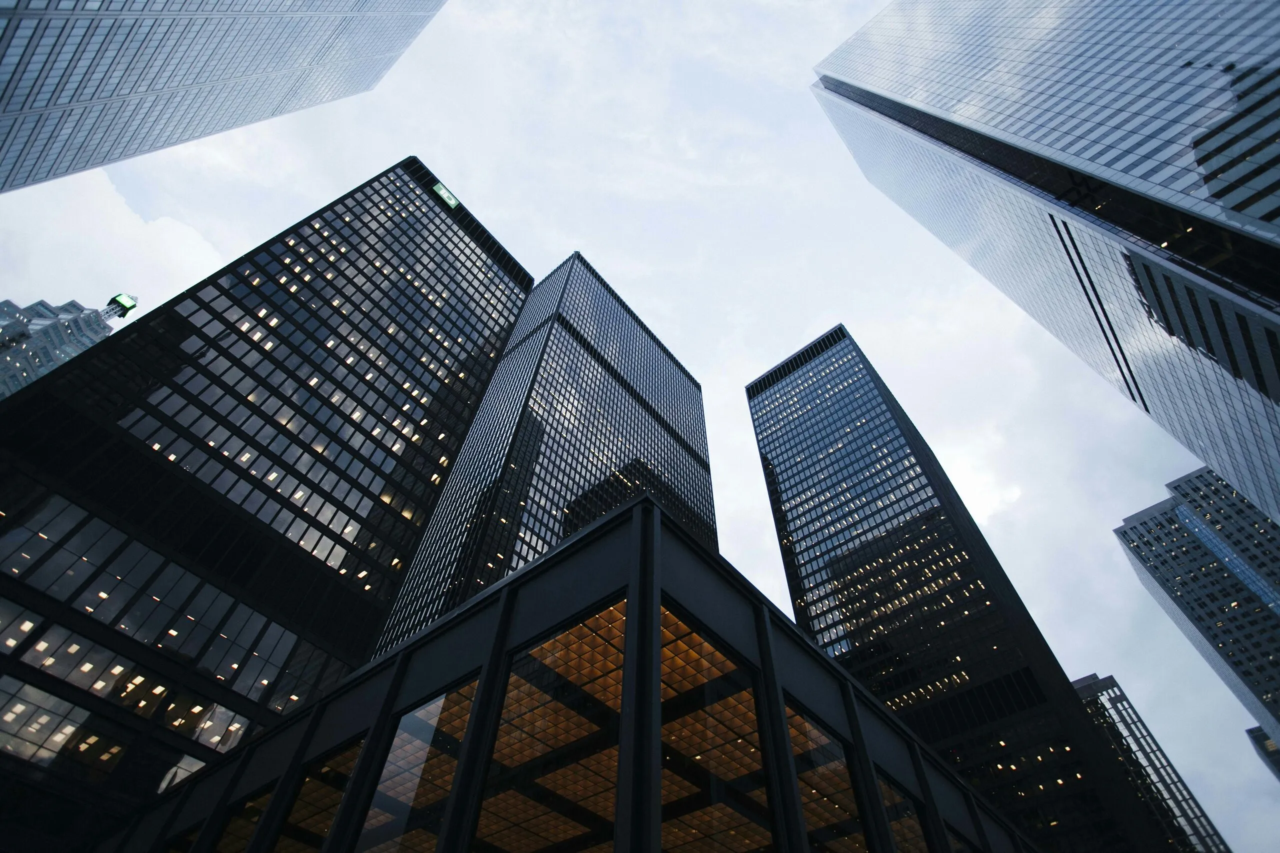 An office building as a metaphor for site management within an operational customer portal.