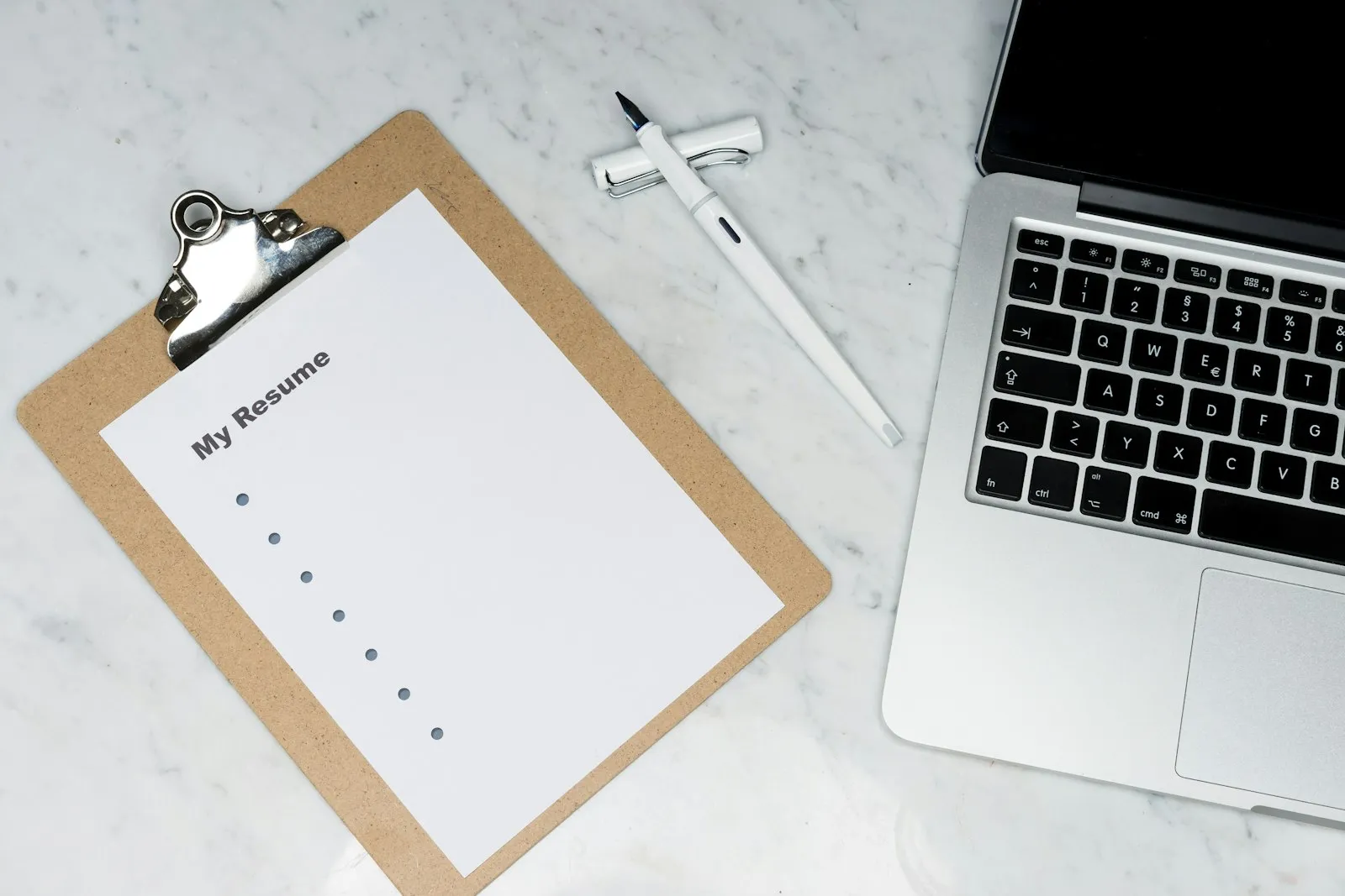 Paper documents and notes used to map an existing operational process.